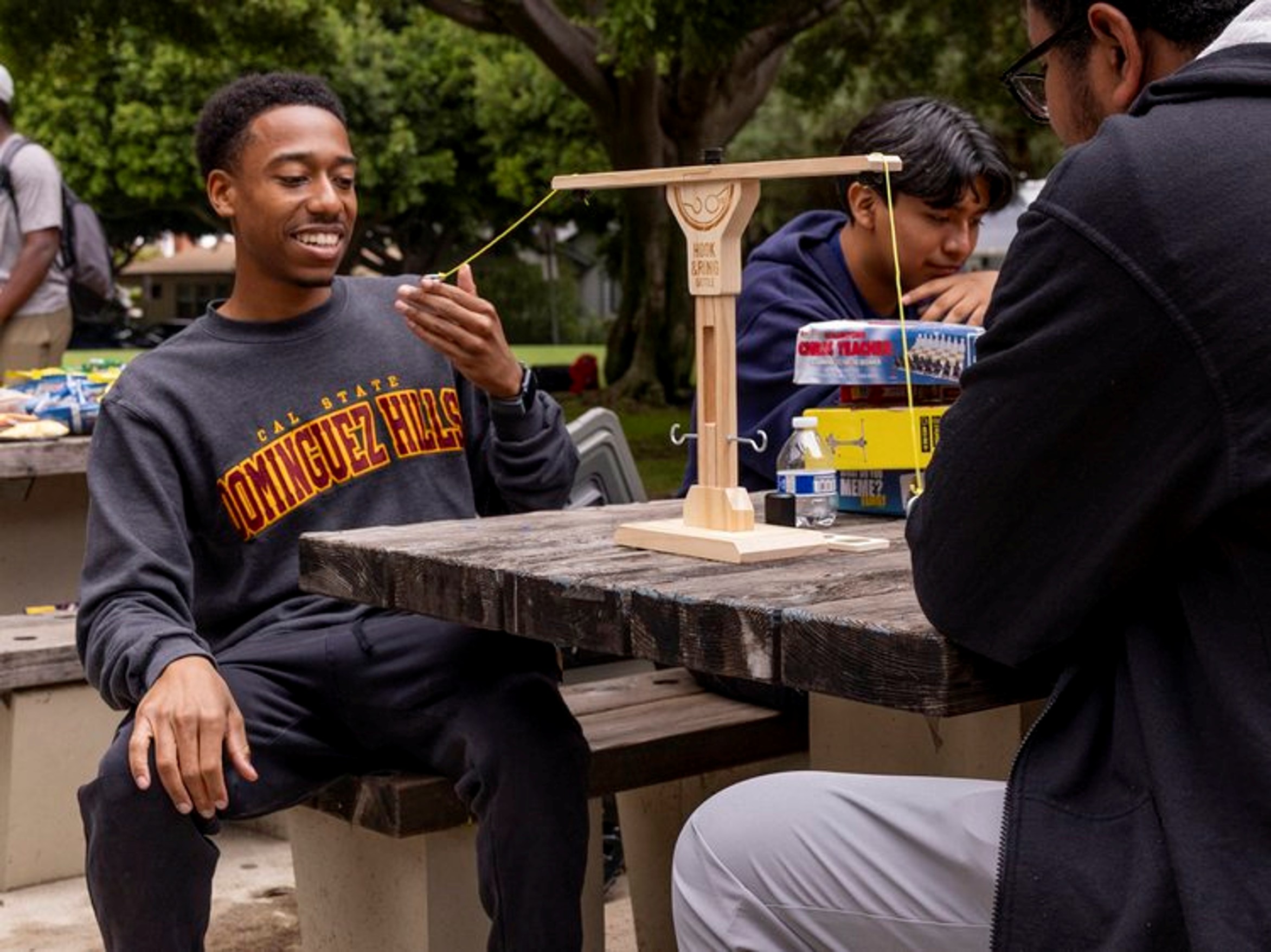 Friends grilling at community cookout